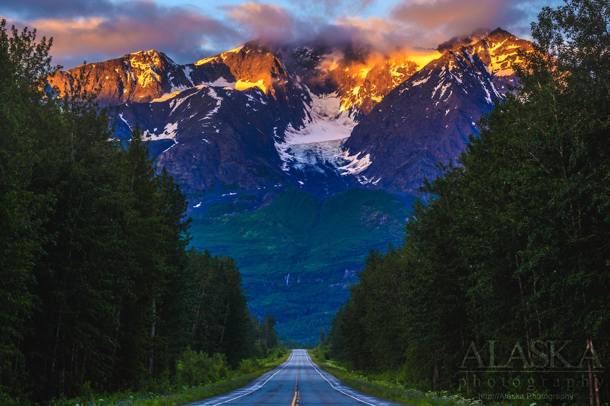 Richardson Highway heads toward Mount Billy Mitchell on an early summers morning.