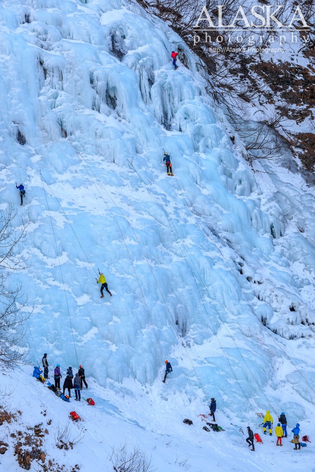 Climbers line across Horsetail Falls during the Valdez Ice Climbing Festival.