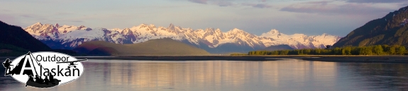 An evening sunset down the Chilkat River. Looking at Mt. Riley on the Chilkat Penninsula and Sinclair Mountain (the tall snowless peak near center). Taken May 17, 2009.