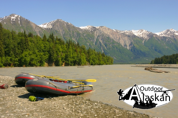 Rafts await a float trip down the Tsirku River with Chilkat Guides. Takshanuk Mountains in the background. Taken July 02, 2008.