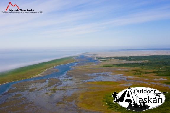 The East Alsek River hugs the coast before emptying into a fog covered Gulf of Alaska. Dry Bay sits out in the distance. Taken July 2009.