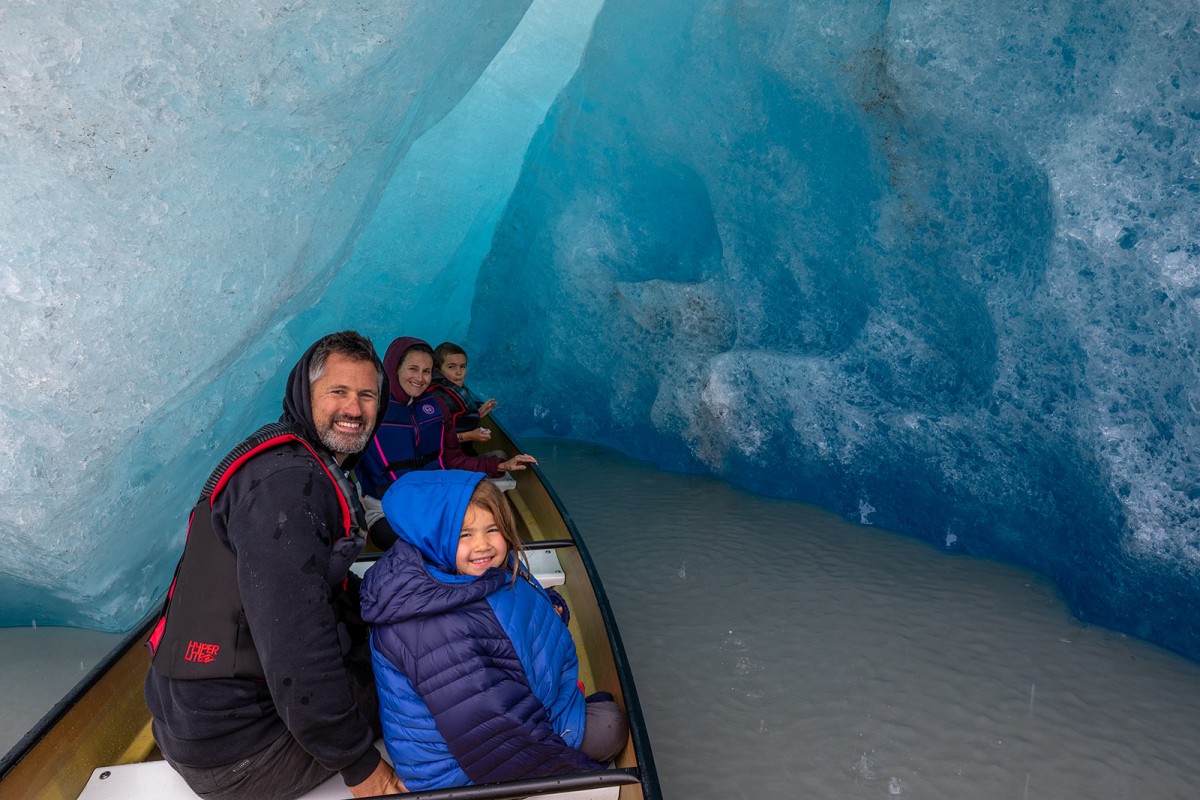 Family tour in an ice cave out at Valdez Glacier.
