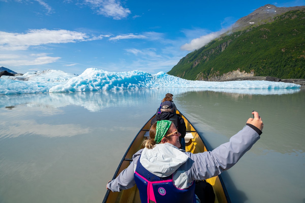 Taking a picture out among the Valdez Glacier on the canoe tour.