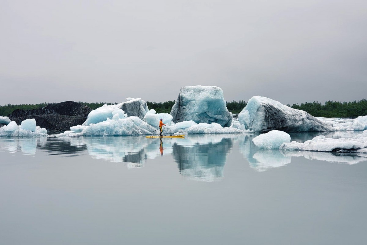 Paddle board around the icebergs of Valdez Glacier.