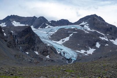 Hike through glacier carved valleys and underneath the retreating glaciers.