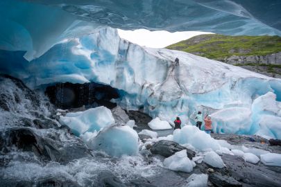 Doing ice climbing around the face of a massive ice cave in Valdez, Alaska.