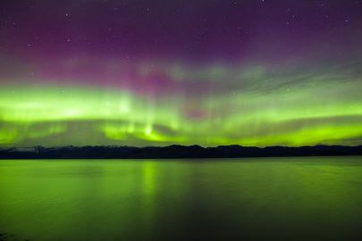 Watching the northern lights as we tour along the Alaska Highway.