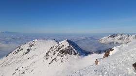 Looking out from Peak 3 over Flattop and out to Denali and the Alaska Range.