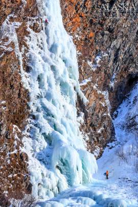 A pair of ice climbers climb Hung Jury, Keystone Canyon, Valdez.