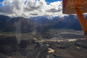 Looking up at Mount Sulzer in the clouds from over Russell Glacier terminus.