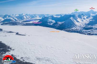 Looking down the Copper River towards the terminus of Allen Glacier and Allen River, with Mt. O'Neel and Mt. Williams in the background.