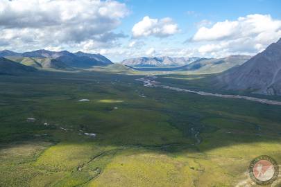 The north slope of Niviak Pass where it runs against the Echooka River. August 2023.