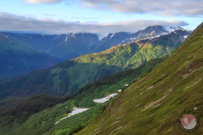 Notch Mountain in the sunlight from Mount Alyeska.