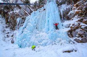 A man ice climbs POS in Keystone Canyon near Valdez.