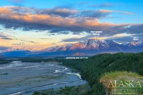 Looking down Matanuska River down at Bodenburg Butte, Pioneer Peak, Salt Peak, and Knik Mountain.