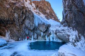 A little over a mile up the creek from where it crosses under the Richardson Highway there's a large pool.