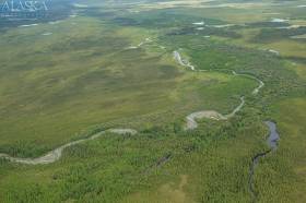 Tetlin River as it flows by Kirshuda Hill.