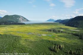 Aerial views of Tuxedni Bay on the west side of Cook Inlet, Alaska.  This was during surveys for juvenile salmon distribution for the Anadromous Fish Catalog for the State of Alaska. Chris Zimmerman, USGS. Public domain