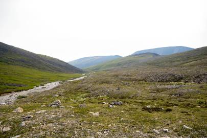 Peeling off from the creek making way to the pass on the right.