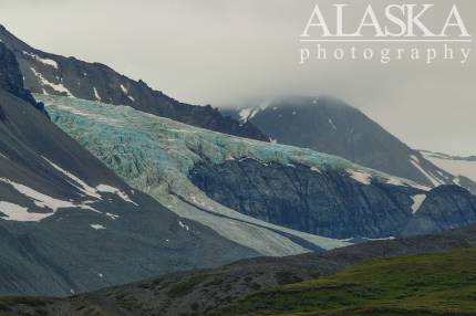 What's left of Gabriel Icefall flows down between Ogive Mountain (foreground) and Skull Peak (back ascending in the clouds).