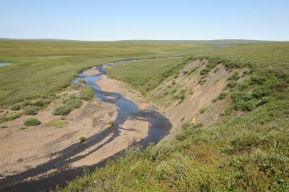 Along Sabbath Creek, specifically 69.575818,-143.274388. USGS Public Domain