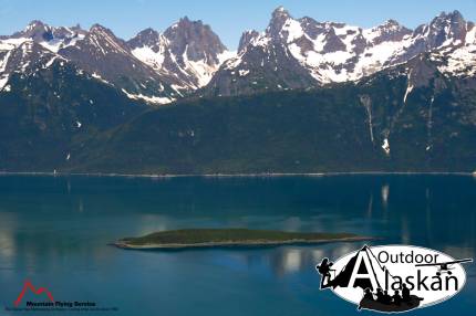 Talsani Island sits in Lynn Canal, and Yeldaglga Creek feeds Lynn Canal on the left.